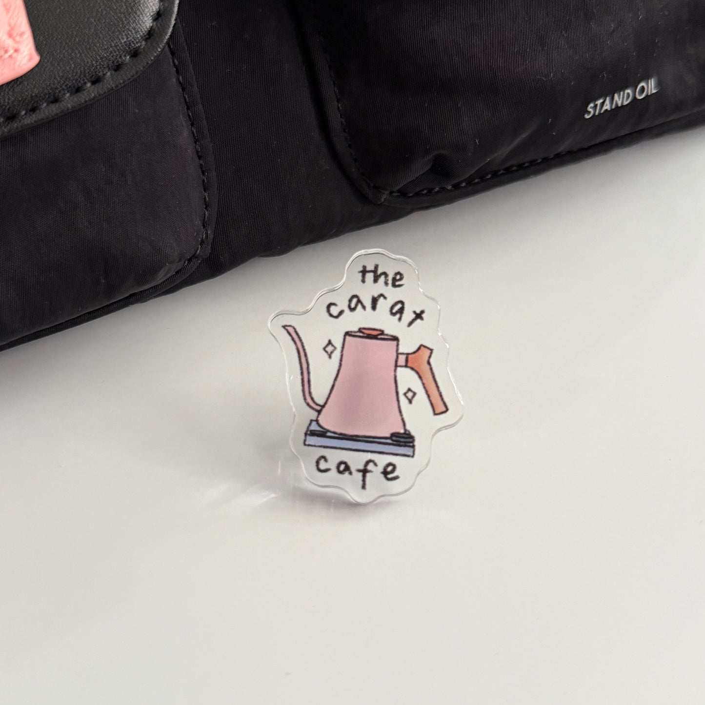 the carat cafe acrylic pins